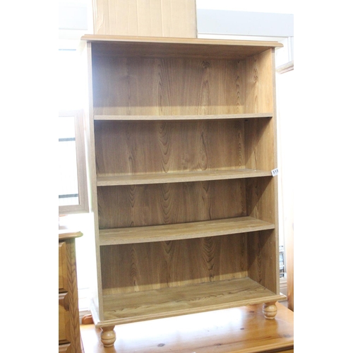 518 - A pine bookcase. 113x 76cm