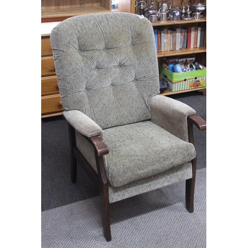 521 - A vintage button-back armchair.106cm