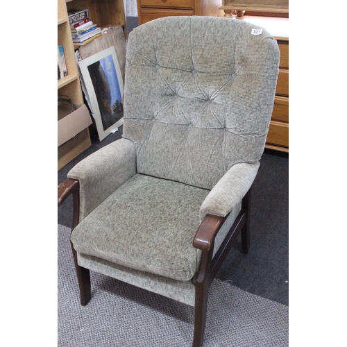 521 - A vintage button-back armchair.106cm