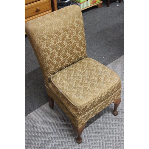 522 - A vintage nursing chair. 79cm