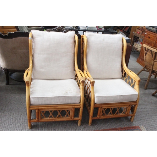 551 - A pair of conservatory chairs.