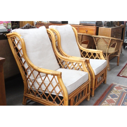 551 - A pair of conservatory chairs.