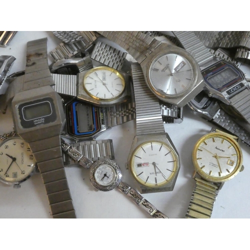 71 - A large lot of assorted vintage wrist watches, to include Sekonda, Beta, Shivas, Quartz, Casio and m... 