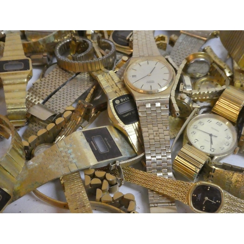 A large lot of assorted vintage metal strap wrist watches, to include ...