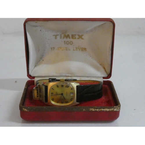 134 - A vintage cased Timex 17 jewel lever wrist watch.