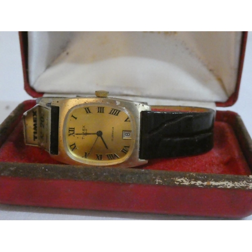 134 - A vintage cased Timex 17 jewel lever wrist watch.