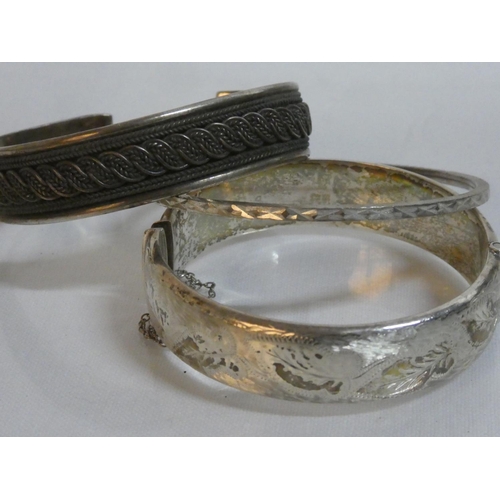 151 - Three Sterling Silver bangles.