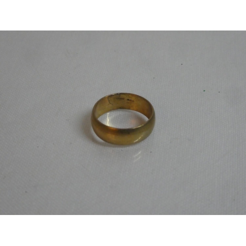 167 - A 9ct gold band ring.