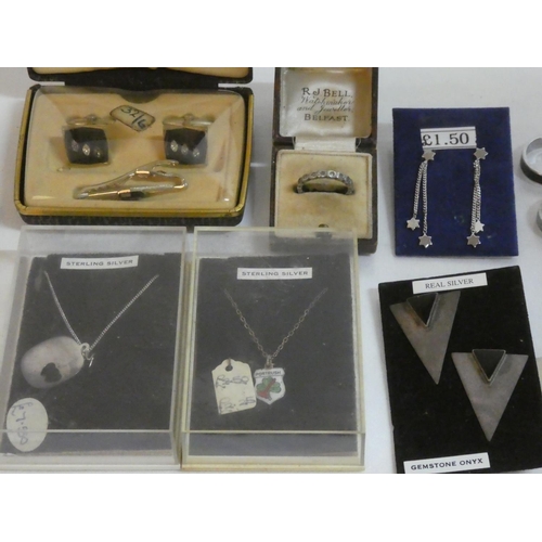 183 - A mixed lot of Sterling Silver earrings, pendant and chains and more.