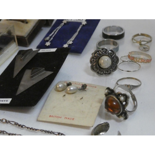 183 - A mixed lot of Sterling Silver earrings, pendant and chains and more.