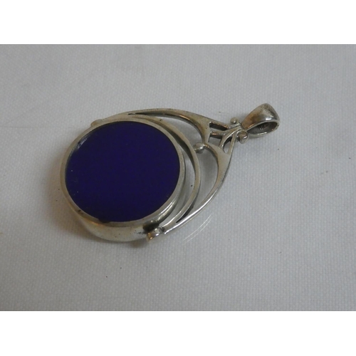 187 - A Sterling Silver swivel double sided fob.