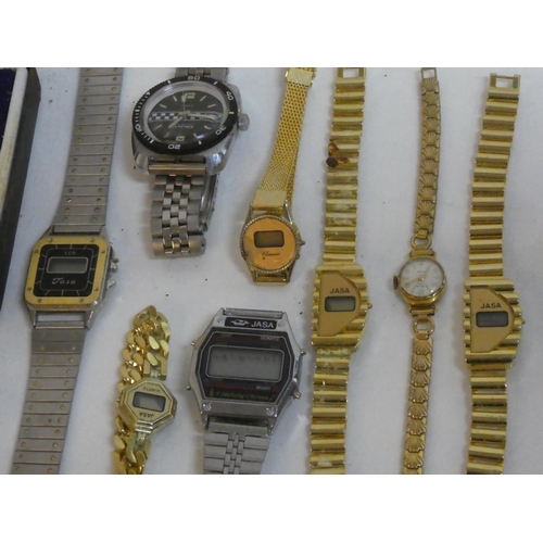 212 - A lot of assorted vintage watches including LCD Tasa digital watch and more.