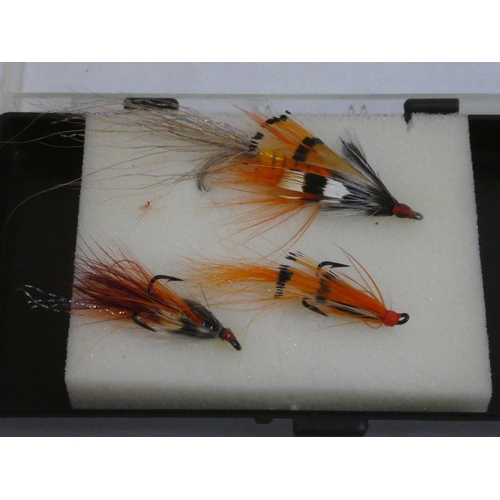 217 - Three cased Billy's Shrimp fishing flies.