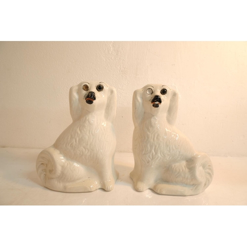 324 - A pair of antique mantle dogs (a/f),