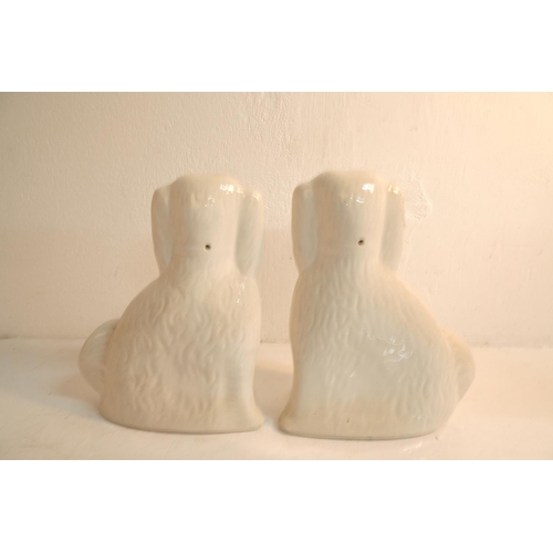 324 - A pair of antique mantle dogs (a/f),