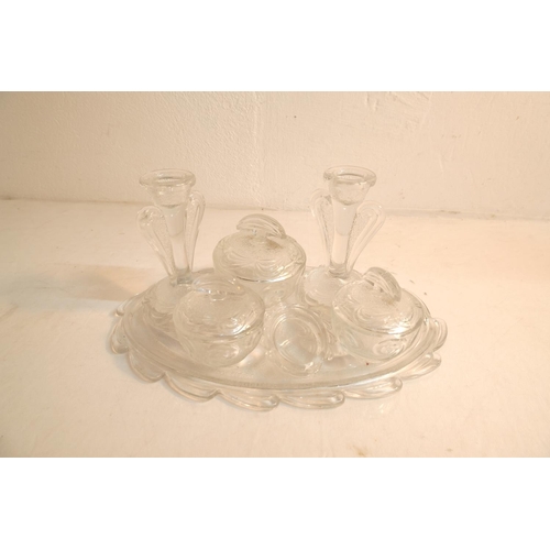 325 - A vintage clear glass dressing table set.