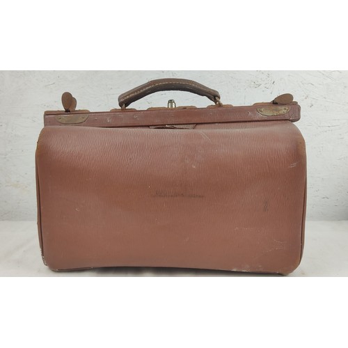 1 - An antique leather Gladstone doctor's bag, initialled SJB.