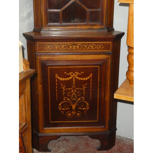 135 - A stunning antique mahogany corner cabinet with inlay detail, measuring 197cm x 70cm.