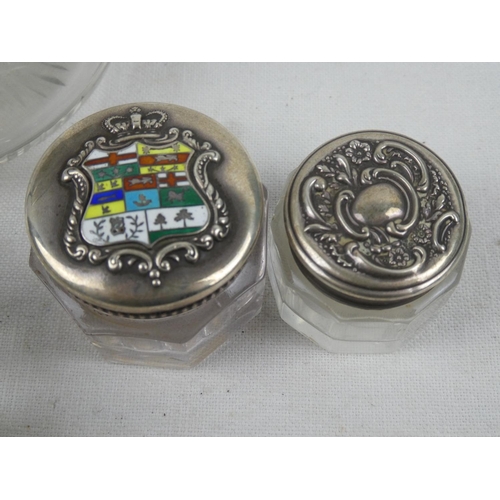 200 - A stunning Sterling Silver topped dressing table jar with enamel detail, a Sterling Silver crested c... 