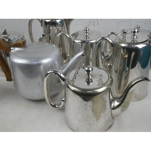 239 - A vintage Picquot Ware teapot and other plated tea and coffee pots.