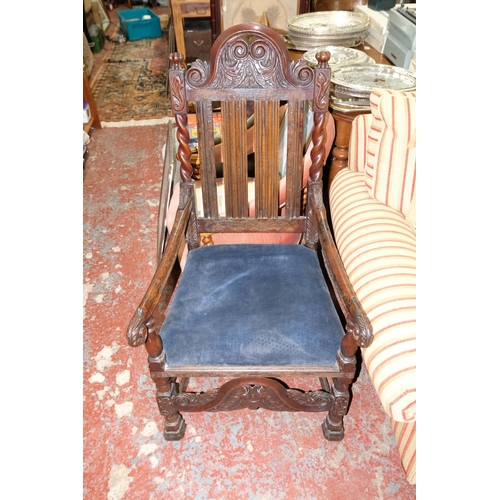 262 - A rare mid 17th Century Oak armchair with decorative carved panels, measuring 115cm.