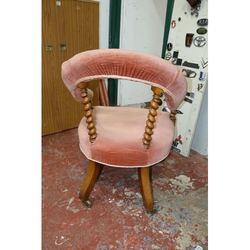 266 - A stunning antique/ Victorian library armchair with turned supports, measuring 76cm.