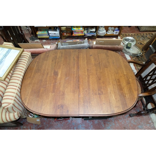 285 - A vintage dinning table, measuring 137cm x 97cm x 76cm.