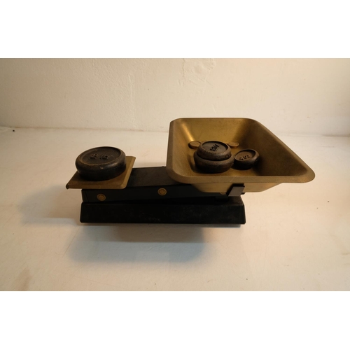 306 - A vintage Waymaster set of scales and two sets of weights.