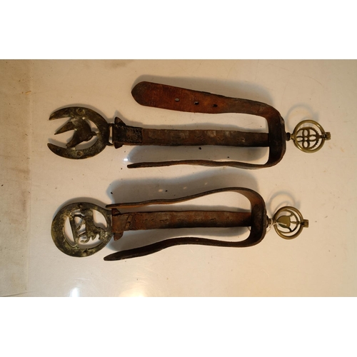 52 - A stunning pair of antique leather horse brasses.