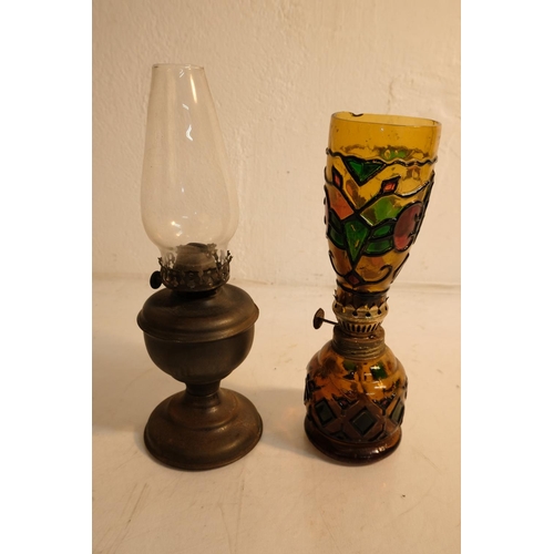 86 - Two vintage oil lamps.