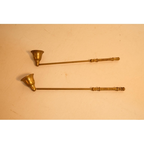 339 - Two brass candle snuffers.