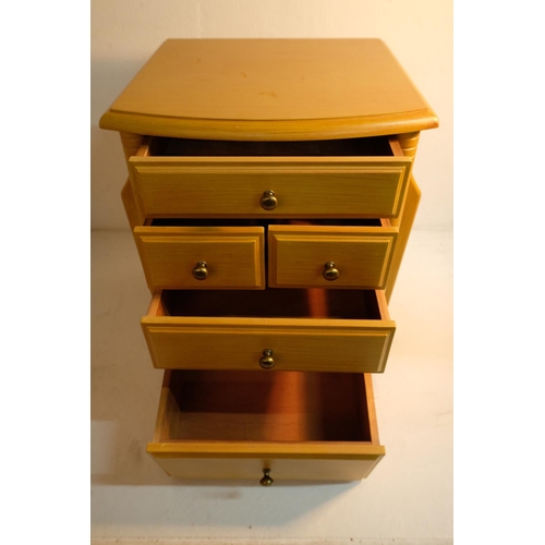 348 - A small Winchcombe pine cabinet with 5 drawers and magazine racks either side, measuring 47cm x 42cm... 