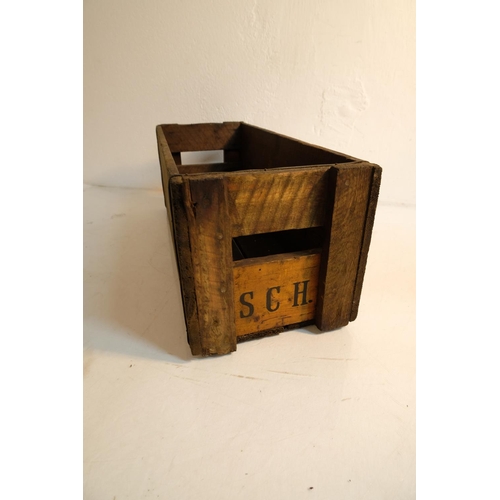 357 - An antique wooden crate embossed 'SCH', measuring 19cm x 20cm x 50cm.