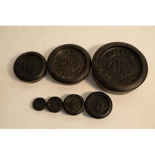 362 - A set of antique cast iron weights.