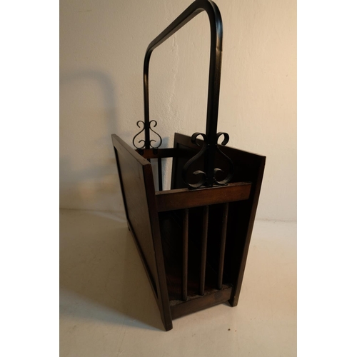 387 - A modern magazine rack with metal handle.