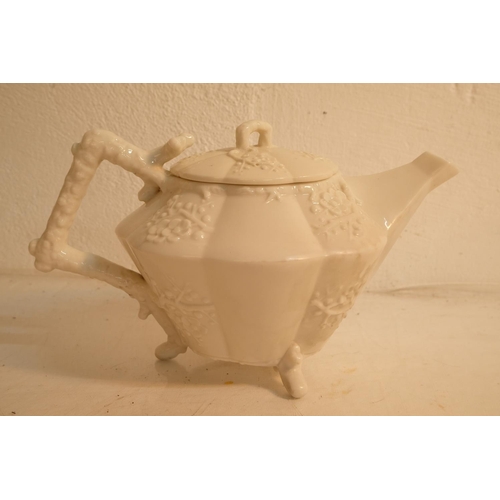 389 - A rare antique first period Belleek teapot with Victorian registration mark. (a/f).