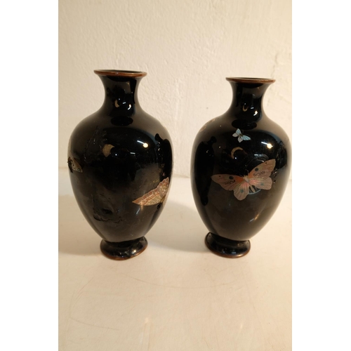 412 - A stunning antique pair of enamelled vases, with decorative butterfly design (a/f).