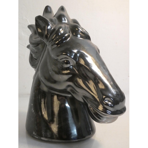 434 - A large ceramic horse head, measuring 27cm.