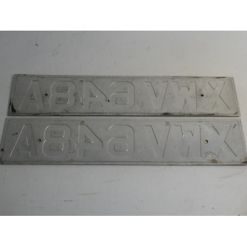 463 - Two vintage metal number plates.