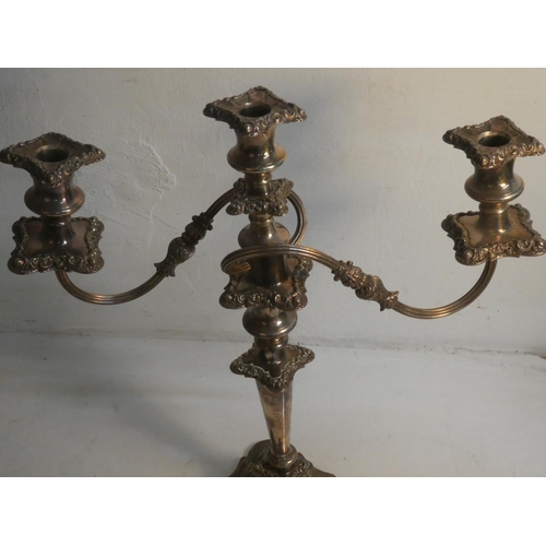 508 - A silver plated three branch candelabra, measuring 46cm.