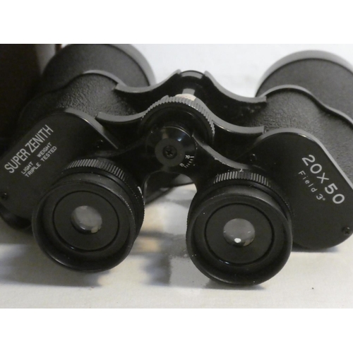 511 - A vintage leather cased Super Zenith  20 x 50 binoculars.