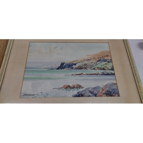 92 - A framed painting of a coastal scene signed by artist, J.Calderwood.