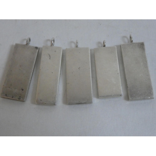 474 - Five Sterling Silver ingots, weighing 151g.