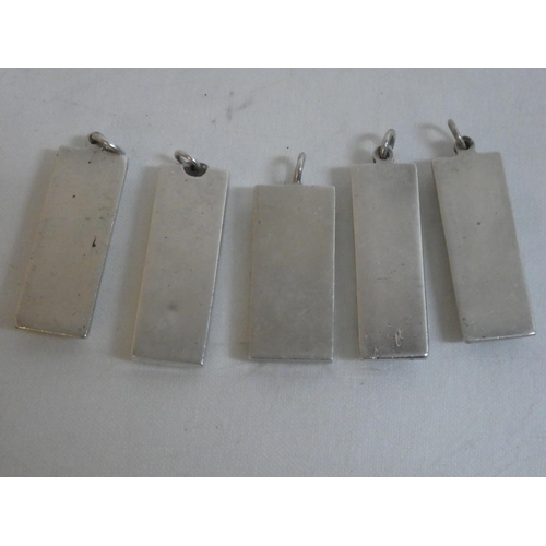 475 - Five Sterling Silver ingots, weighing 150g.