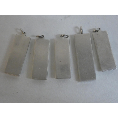 479 - Five Sterling Silver ingots, weighing 154g.