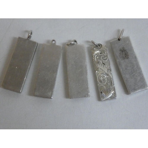 496 - Five Sterling Silver ingots, weighing 136g.