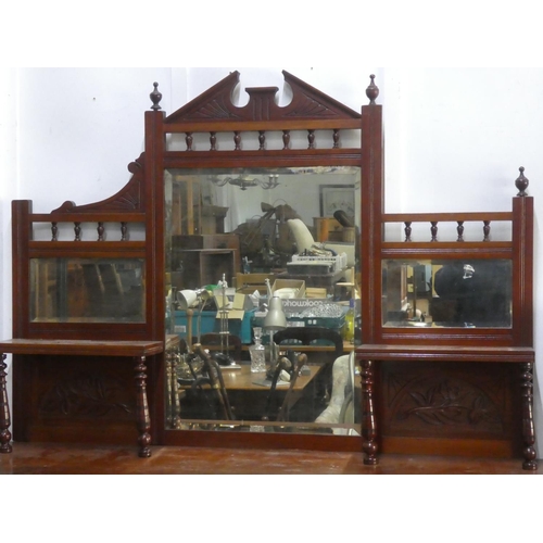 154 - An antique mahogany sideboard with mirror back.