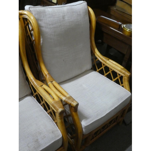 551 - Two bamboo framed conservatory chairs.