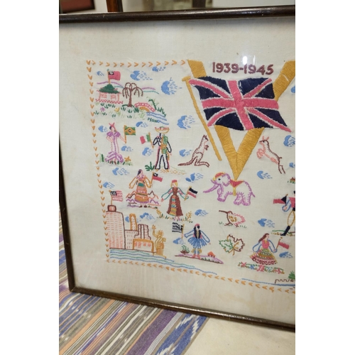 267 - Two commemorative needlework pictures, measuring 36cm x 27cm and 36cm x 46cm.