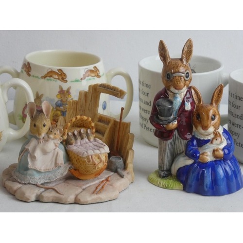 33 - A Royal Doulton Bunnykins 'Family Photograph', two Royal Doulton two handled cups, two Wedgwood Pete... 